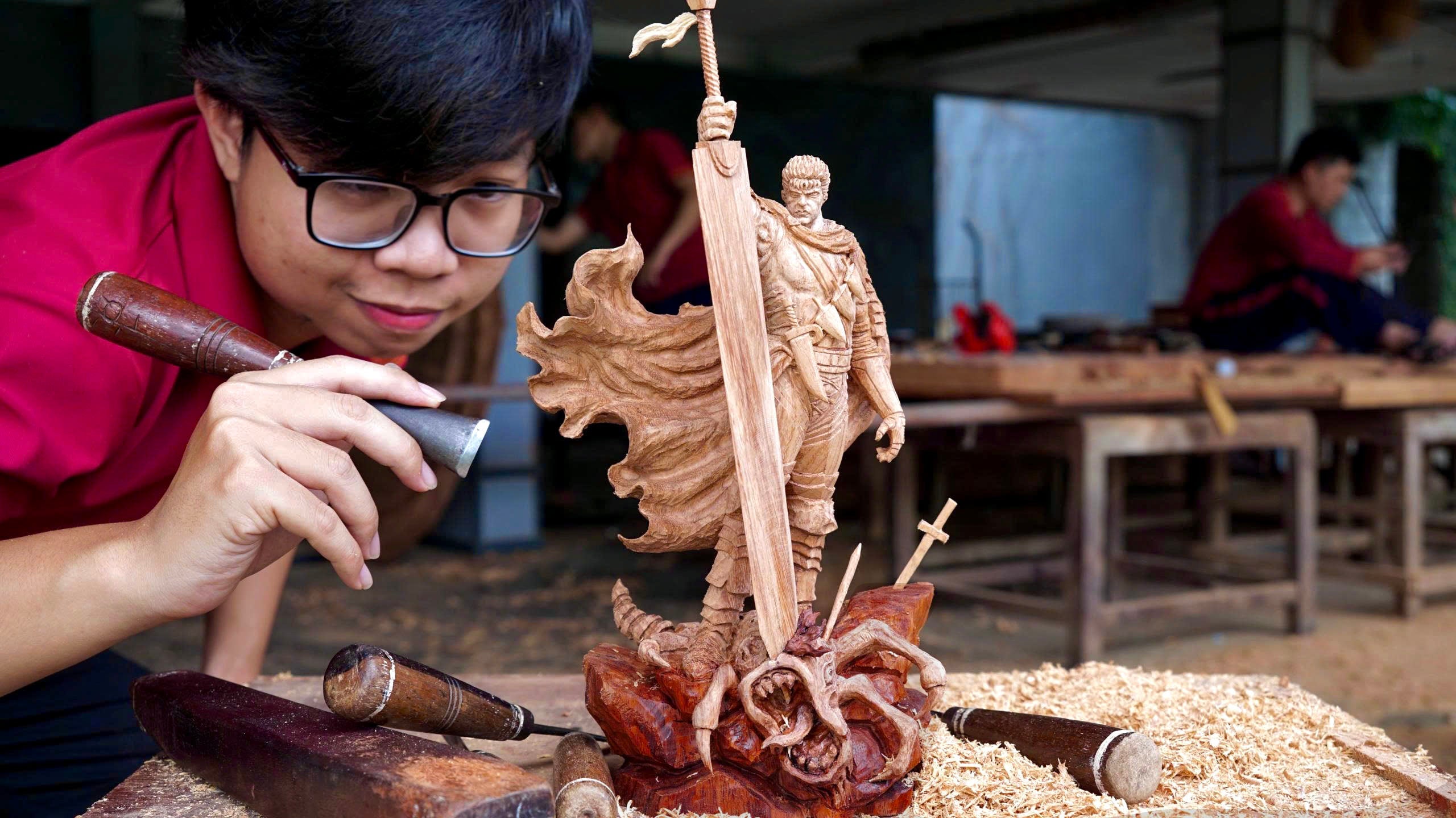 Berserk figure wooden sculpture 